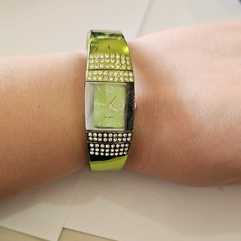 Avon Green and Silver Women's Watch